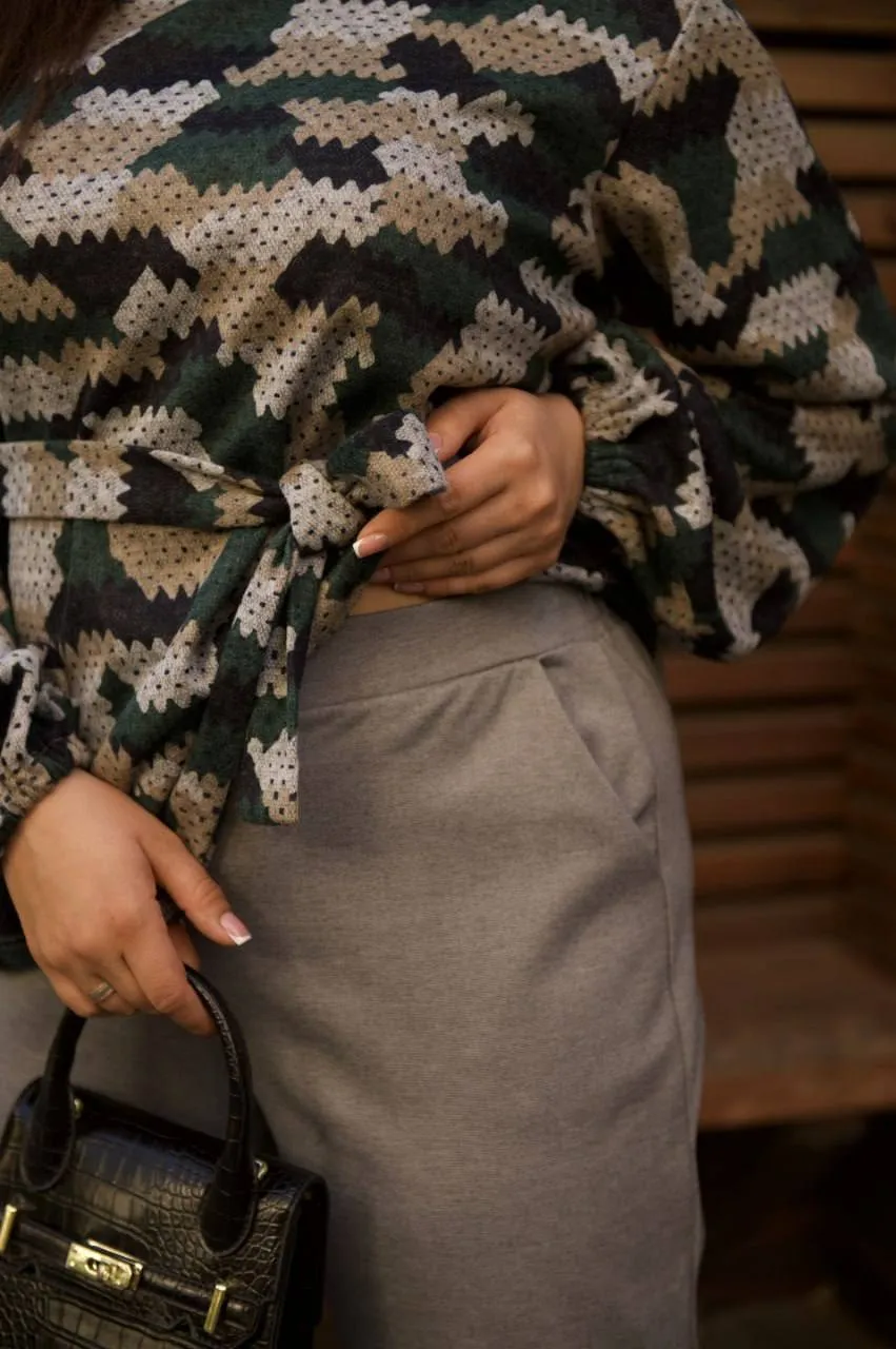 Knit blouse with a belt