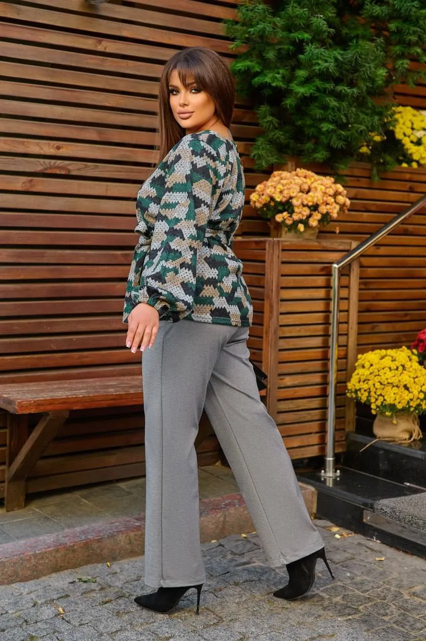 Knit blouse with a belt