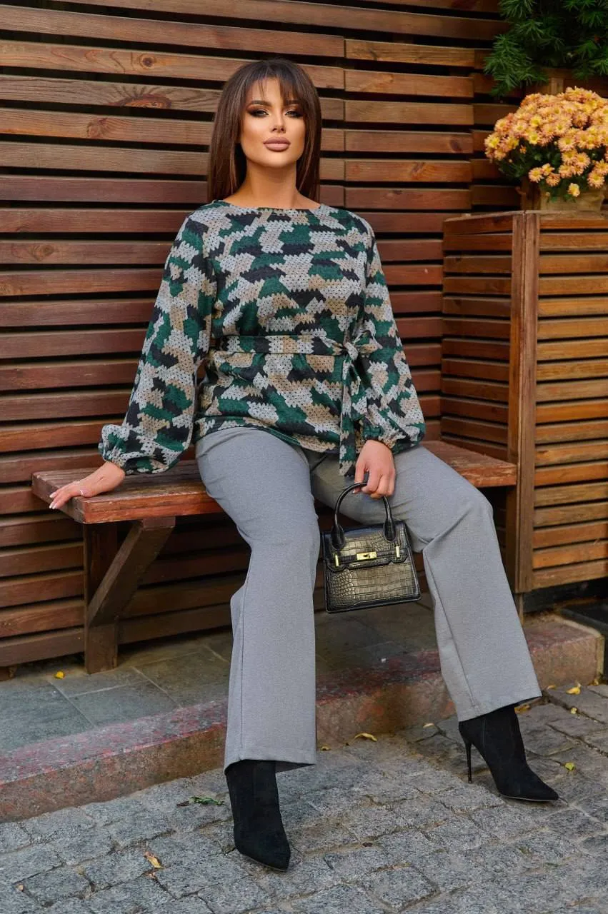 Knit blouse with a belt