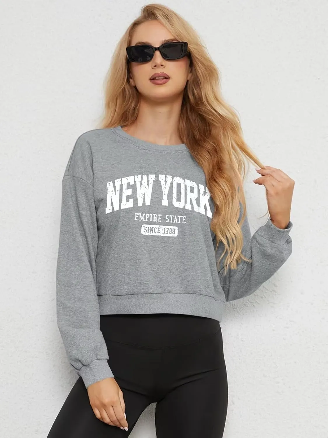 ORANDESIGNE Womens Cropped Letter Printed Sweatshirts Graphic Crewneck Long Sleeve Pullover Casual Loose Fit Tops